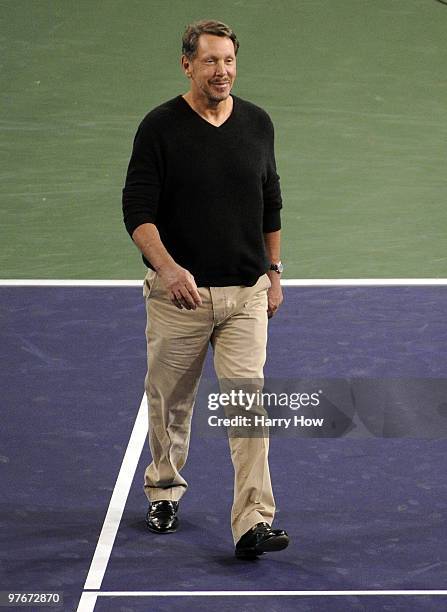 Oracle CEO Larry Ellison makes his way to center court during the BNP Paribas Open Players Party & Hit for Haiti at the Indian Wells Tennis Garden on...