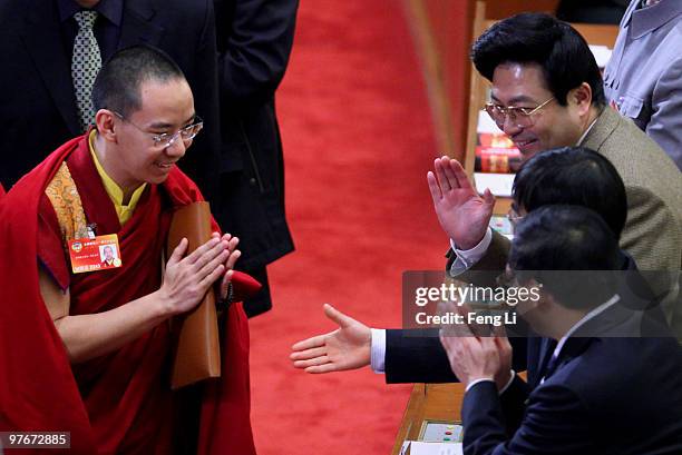 Gyaltsen Norbu , known as the Panchen Lama, arrives for the closing meeting of the Chinese People's Political Consultative Conference at the Great...