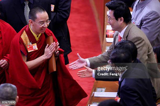 Gyaltsen Norbu , known as the Panchen Lama, arrives for the closing meeting of the Chinese People's Political Consultative Conference at the Great...