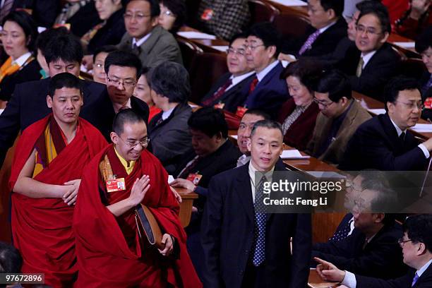 Gyaltsen Norbu , known as the Panchen Lama, arrives for the closing meeting of the Chinese People's Political Consultative Conference at the Great...