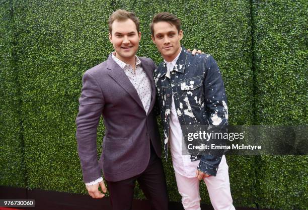 Actors Justin Prentice and Timothy Granaderos attend the 2018 MTV Movie And TV Awards at Barker Hangar on June 16, 2018 in Santa Monica, California.