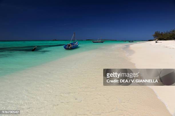 Beach with fishing boats on Nosy Antaly-Be island, Mer d'Emeraude, Emerald sea, Diego Suarez bay, Madagascar.