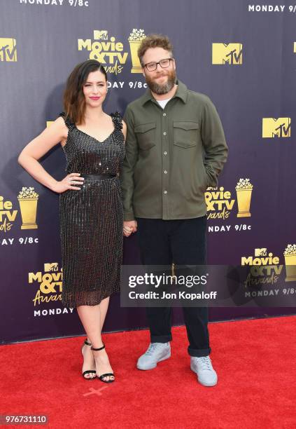 Actor Seth Rogen and Lauren Miller attend the 2018 MTV Movie And TV Awards at Barker Hangar on June 16, 2018 in Santa Monica, California.