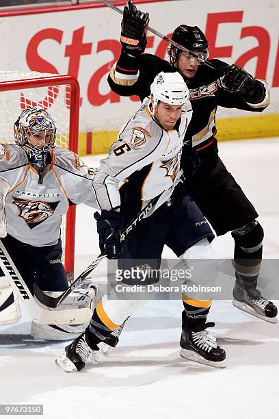 Bobby Ryan of the Anaheim Ducks battles for postion against Shea Weber and Pekka Rinne of the Nashville Predators during the game on March 12, 2010...