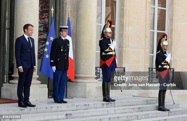 French President Emmanuel Macron waits for the arrival of the new Italian Prime Minister Giuseppe Conte at the Elysee Palace on June 15, 2018 in...