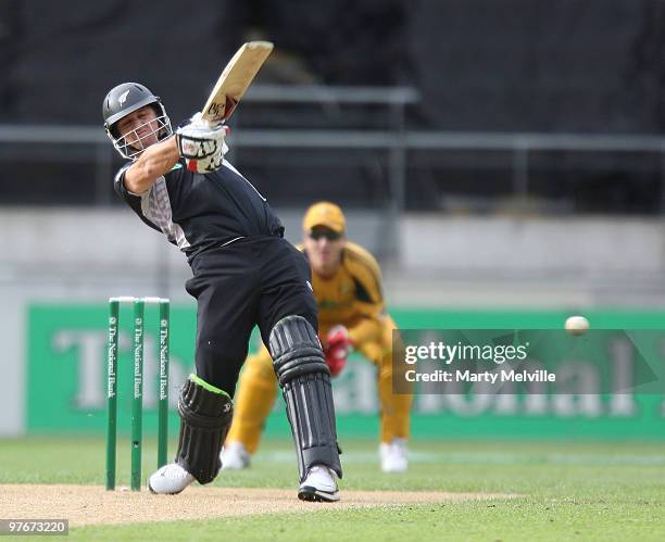 Shane Bond of the Blackcaps hits the ball during the 5th ODI match between New Zealand and Australia at Westpac Stadium on March 13, 2010 in...