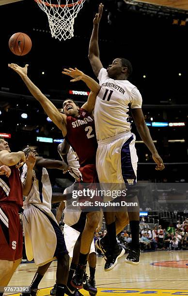 Landry Fields of the Stanford Cardinal shoots and picks up the foul from Matthew Bryan-Amaning of the Washington Huskies during the semifinals of the...