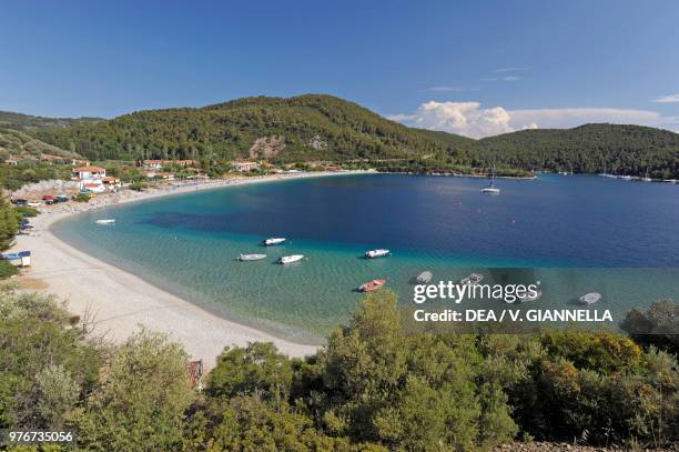 Boats anchored at Panormos Beach, Skopelos Island, Northern Sporades, Greece.