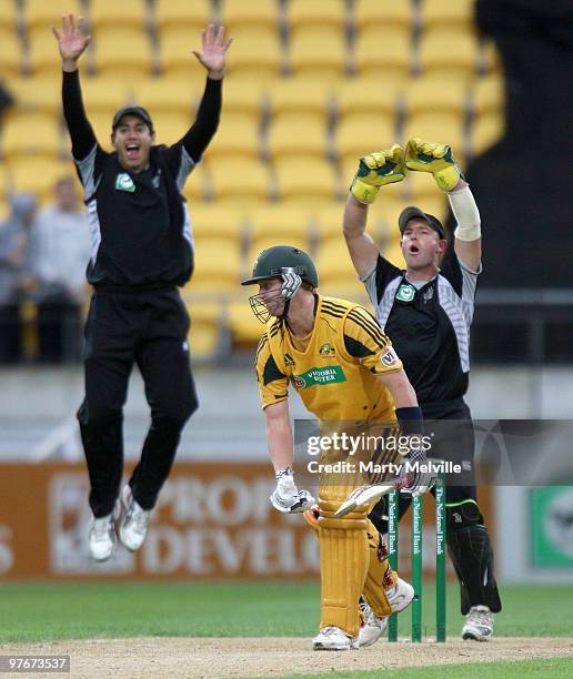 Ross Taylor and Gareth Hopkins of the Blackcaps appeal for a LBW decision on Cameron White of Australia during the 5th ODI match between New Zealand...