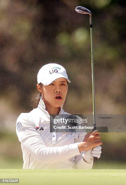 He-Yong Choi of Korea plays out of a bunker during day three of the Women's Australian Open at The Commonwealth Golf Club on March 13, 2010 in...