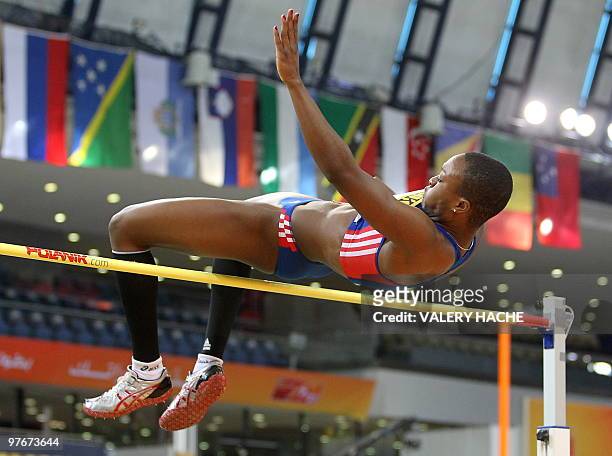 France's Antoinette Nana Djimou Ida competes in the women's pentathlon high jump at the 2010 IAAF World Indoor Athletics Championships at the Aspire...