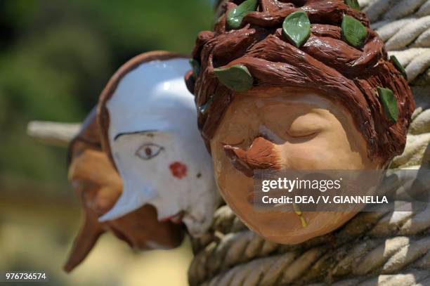 Albero di Pinocchio sculpture in the village of Collodi, Tuscany, Italy, detail.