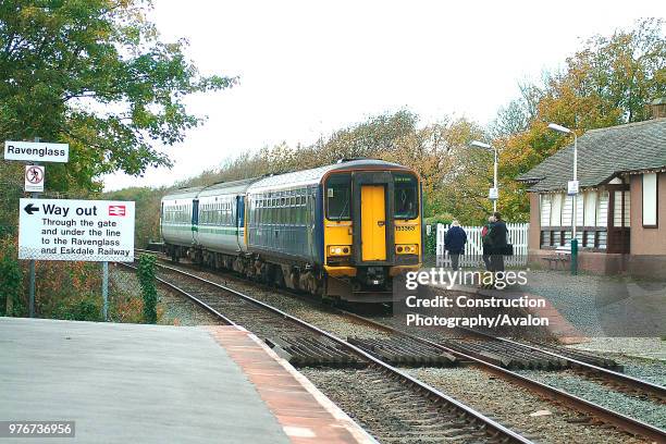 The Cumbrian Coast services are a lifeline to the scattered local communities as shown at Ravenglass as passengers wait to board the approaching...