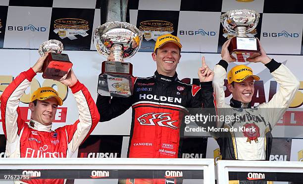 Lee Holdsworth of the Fujitsu Racing/GRM team, Garth Tander of the Toll Holden Racing Team and James Courtney of the Jim Beam Racing team after race...