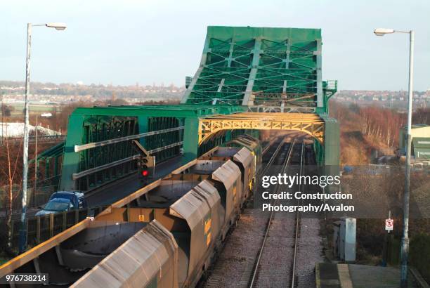 The docks at Immingham not only supply raw materials for the steelworks at Scunthorpe but also coal for power stations further inland sited by old...