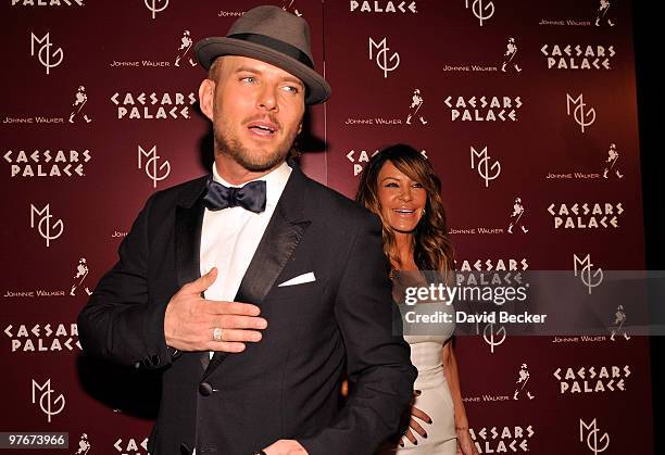 Singer/songwriter Matt Goss and choreographer Robin Antin arrive at the grand opening of his show, "Matt Goss Live from Caesars Palace" March 12,...