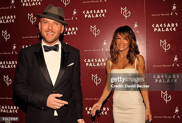 Singer/songwriter Matt Goss and choreographer Robin Antin arrive at the grand opening of his show, "Matt Goss Live from Caesars Palace" March 12,...