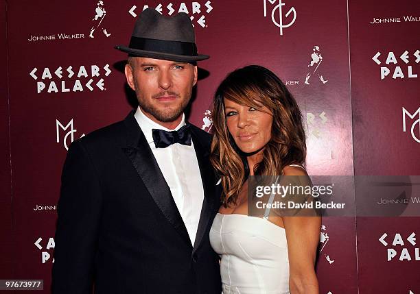 Singer/songwriter Matt Goss and choreographer Robin Antin arrive at the grand opening of his show, "Matt Goss Live from Caesars Palace" March 12,...