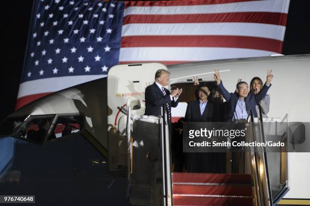President of the United States Donald J Trump and First Lady Melania Trump welcoming three Americans freed from North Korean prison, Joint Base...