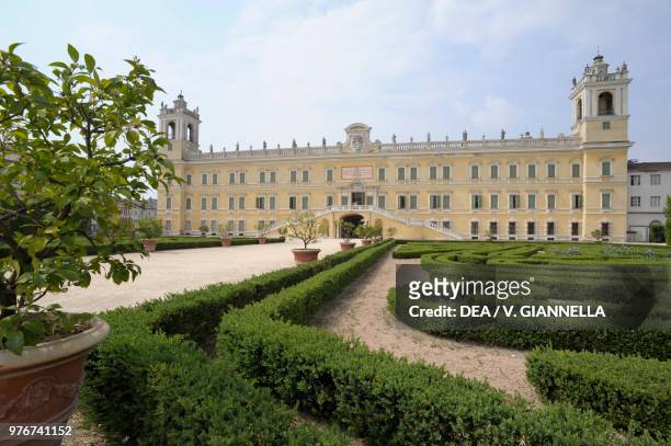 The Ducal Palace of Colorno, designed by the architect Ferdinando Galli Bibiena , seen from the parterre of the French formal garden, Emilia-Romagna,...
