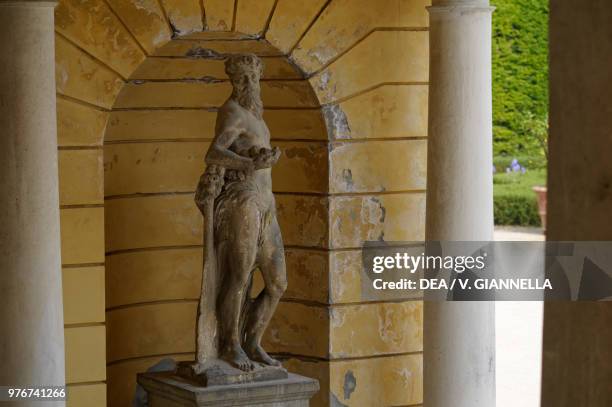 Statue adorning a nook in the garden of the Ducal Palace of Colorno, Emilia-Romagna, Italy, 17th century.