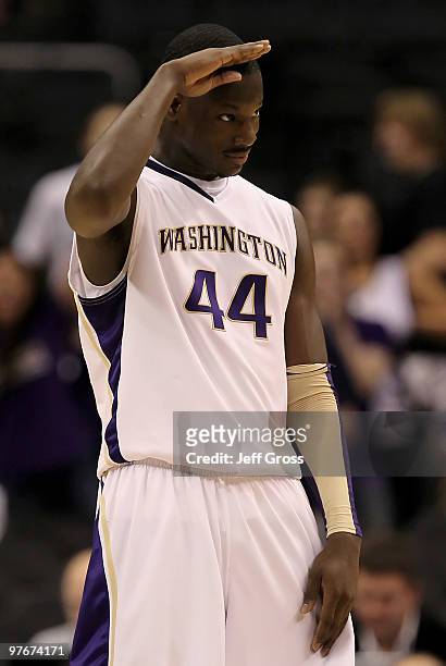 Darnell Gant of the Washington Huskies salutes the fans following his teams victory over the Stanford Cardinal during the Semifinals of the Pac-10...