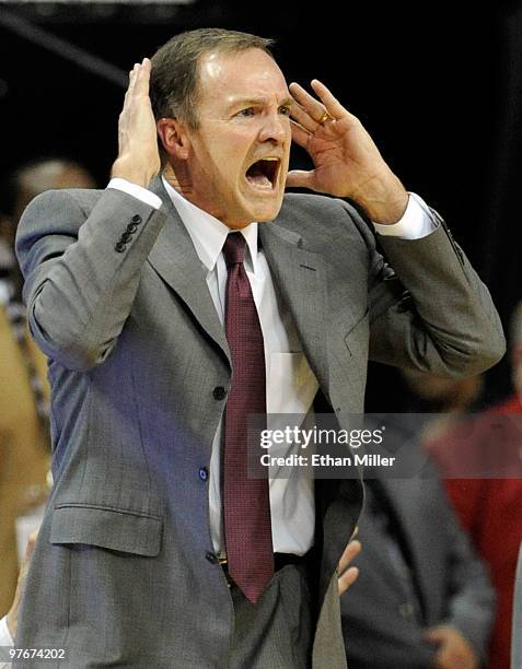 Head coach Lon Kruger of the UNLV Rebels reacts during a semifinal game against the Brigham Young University Cougars during the Conoco Mountain West...