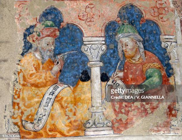 Scribes, fresco in the church of Saint Mary of the Assumption, Armeno, Piedmont, Italy, 16th century.