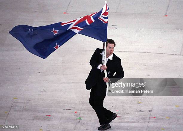 Flag bearer Adam Hall of New Zealand leads his team through the stadium during the Opening Ceremony of the 2010 Vancouver Winter Paralympic Games at...