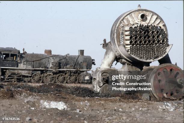 The remains of an American inspired JF Class Mikado 2-8-2 at Manzhouli on China's Russian border in Inner Mongolia another locomotive of the same...