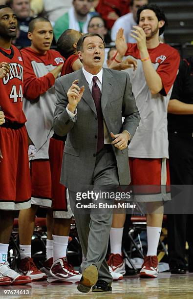 Head coach Lon Kruger of the UNLV Rebels yells to his players during a semifinal game against the Brigham Young University Cougars at the Conoco...
