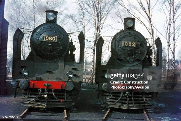 The turntable at Kouvola on 8 April 1972 with two Finnish Railway's TR1 Class Mikado 2-8-2s.