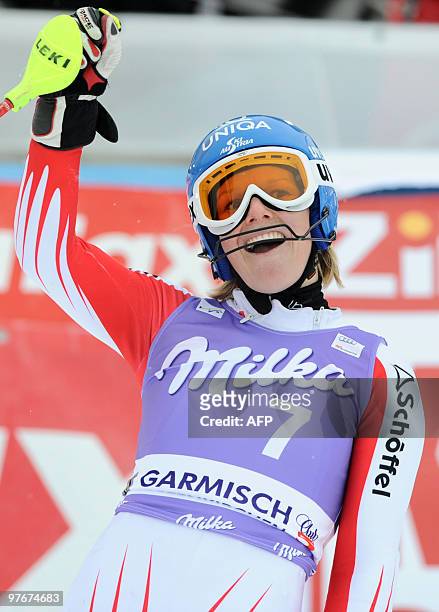 Austria's Marlies Schild reacts in the finish area after the first run during the women's Alpine skiing World Cup Slalom finals in Garmisch...