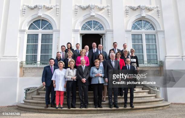 April 2018, Germany, Meseberg: The members of the German government gather for a group picture on the occasion of the closed cabinet meeting outside...