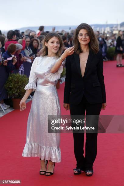 Lola Bessis and Esther Garrel attend red carpet for the closing ceremony of Cabourg Film Festival on June 16, 2018 in Cabourg, France.