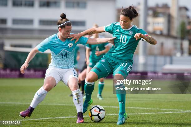 April 2018, Slovenia, Domzale: Soccer, Women's World Cup qualification, Europe, group stages, Slovenia vs Germany. Germany's Dzsenifer Marozsan and...