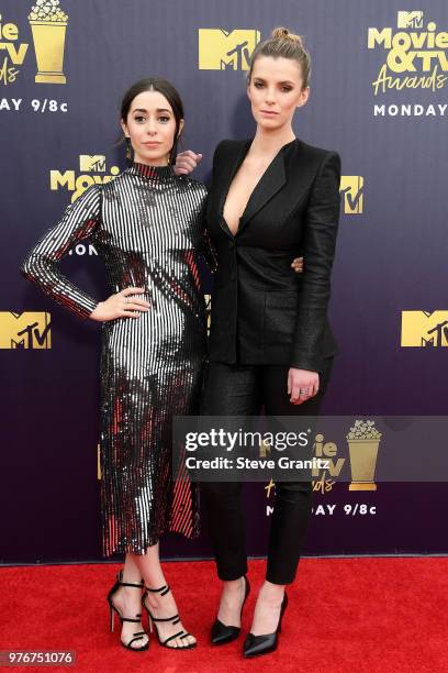 Actors Cristin Milioti and Betty Gilpin attend the 2018 MTV Movie And TV Awards at Barker Hangar on June 16, 2018 in Santa Monica, California.