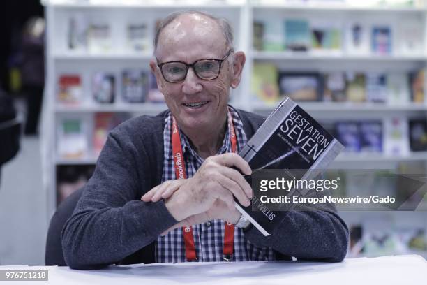 Portrait of author J Stewart Willis with his book Gestation Seven, New York City, New York, May 31, 2018.