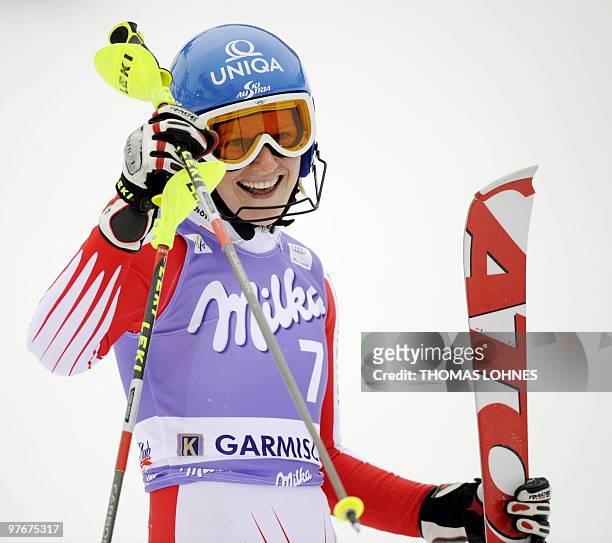 Austria's Marlies Schild celebrates after competing in the women's Alpine skiing World Cup Slalom finals in Garmisch Partenkirchen, southern Germany...