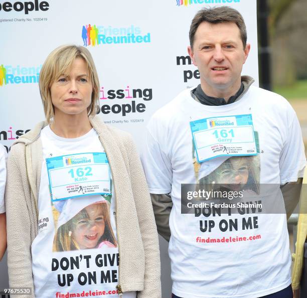 Kate McCann and Gerry McCann, wearing t-shirts printed with a photo of their missing daughter Madeleine, attend the Miles For Missing People 10km...