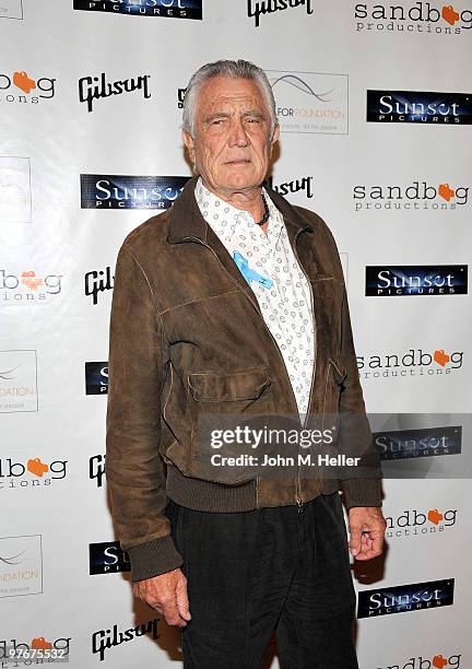 Actor George Lazenby attends the "Unity For Peace" Benefit Concert at the House Of Blues on March 12, 2010 in Los Angeles, California.