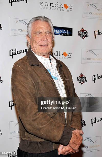 Actor George Lazenby attends the "Unity For Peace" Benefit Concert at the House Of Blues on March 12, 2010 in Los Angeles, California.