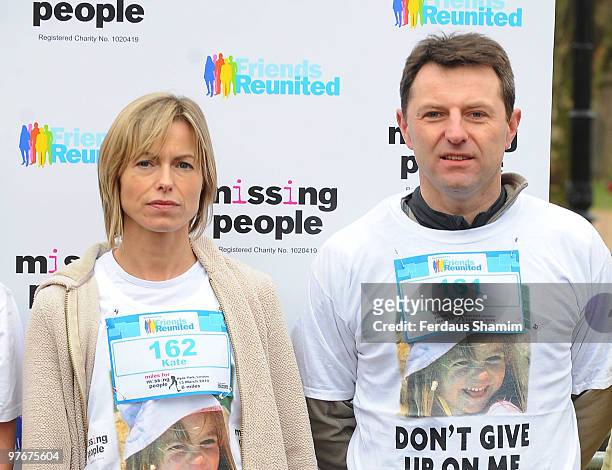 Kate McCann and Gerry McCann, wearing t-shirts printed with a photo of their missing daughter Madeleine, attend the Miles For Missing People 10km...