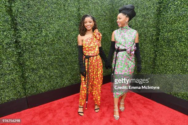Recording artists Chloe Bailey and Halle Bailey of R&B duo Chloe X Halle attend the 2018 MTV Movie And TV Awards at Barker Hangar on June 16, 2018 in...
