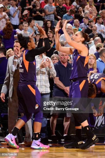 Diana Taurasi of the Phoenix Mercury high fives Briann January of the Phoenix Mercury during the game against the Connecticut Sun on June 16, 2018 at...