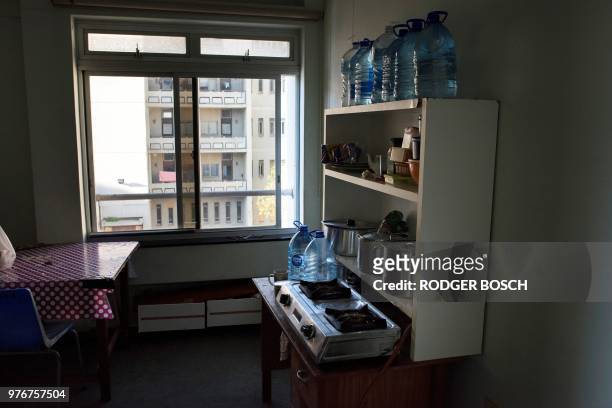 Picture shows a room at the opposite side of the deserted Helen Bowden Nurses home where people live illegally, in the city centre near the harbour...