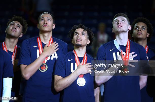 Trayce Davis, Kamaka Hepa, Cole Anthony, Matthew Hurt and Jeremiah Robinson of the United States celebrate winning Gold against Canada in the final...