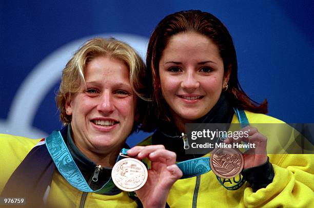 Rebecca Gilmore and Loudy Tourky of Australia celebrate their bronze medal in the Women's 10m Synchronise diving held at the Sydney International...