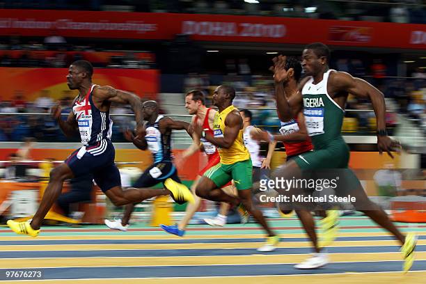 Dwain Chambers of Great Britain competes and wins the Mens 60m Semi Final during Day 2 of the IAAF World Indoor Championships at the Aspire Dome on...