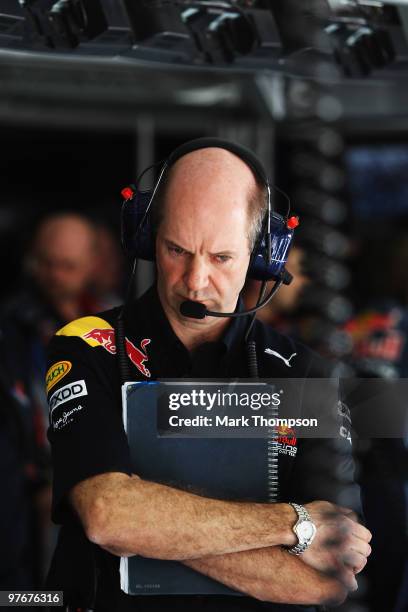 Red Bull Racing Chief Technical Officer Adrian Newey looks on in their team garage during qualifying for the Bahrain Formula One Grand Prix at the...